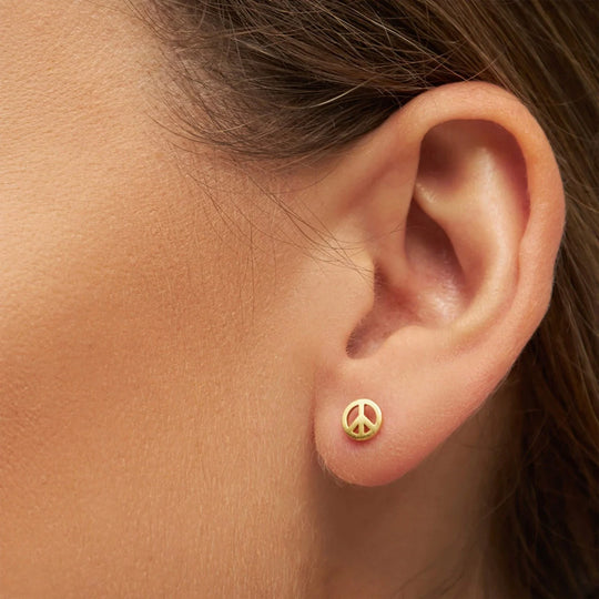 The Peace gold-plated earring is a powerful symbol. As Worn Detail.