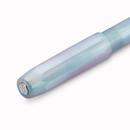 The Kaweco Perkeo rollerball pen in Irridescent Pearl features an ergonomic grip, octagonal cap and hexadecagon shaped barrel.