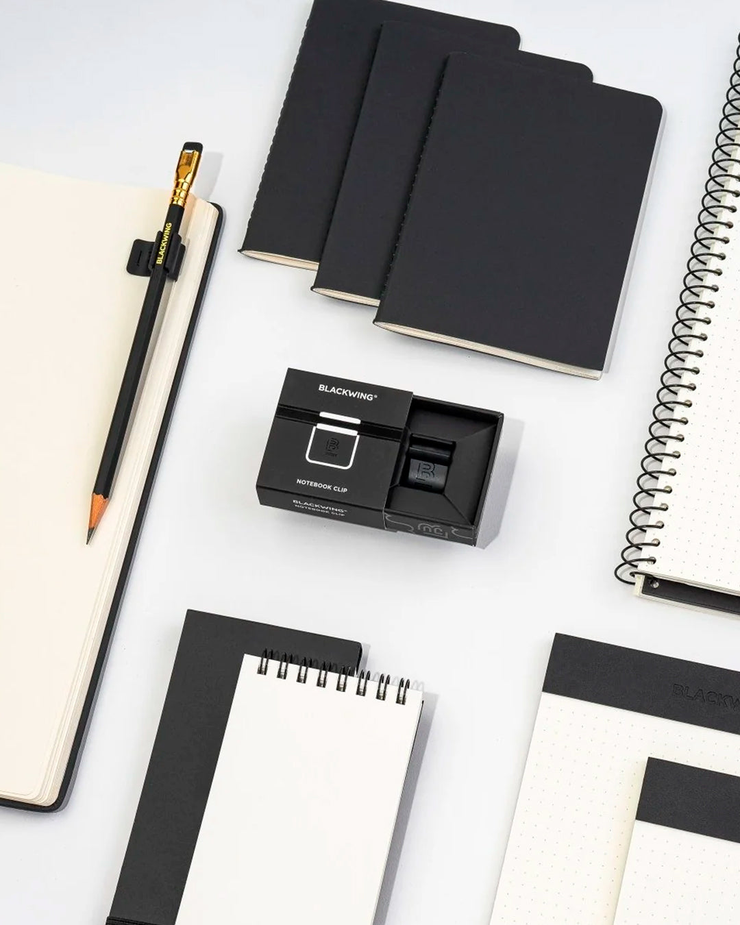 The Blackwing Pencil Holder is a simple metal clip designed to attach securely to the cover of your favourite notebook, giving your pencil a dedicated place to live.
