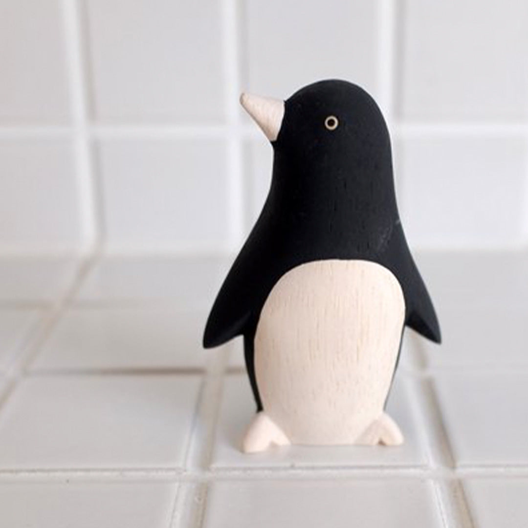 Wooden Penguin from TLab, Cut, carved, finely sanded and hand painted by craftsmen in Bali, each piece is somewhat different and unique.