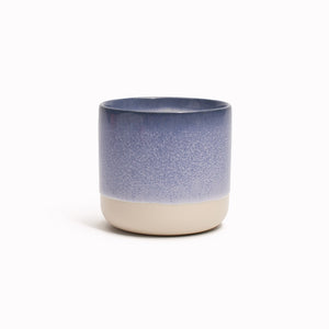 The yellow rimmed, pink drip glazed Quench Cup is handmade in Denmark - meaning glaze colour and finish will never be exactly the same on any two items, but this is absolutely a part of their unique appeal.