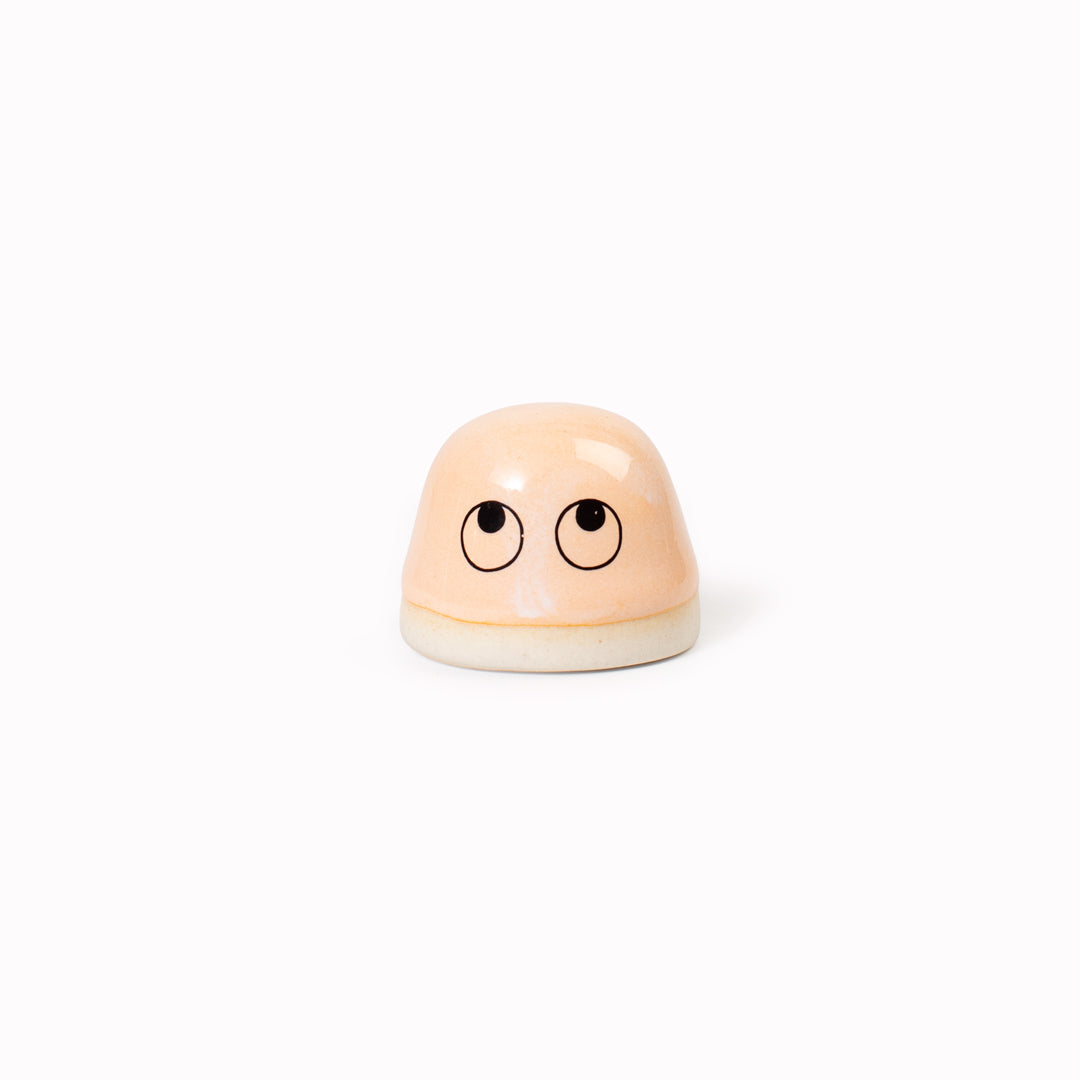 Inspired by Japanese Shinto beliefs that all objects have a soul each Familia Dot member is given life with a cute pair of eyes. They are hand-cast in solid, heavy white porcelain
