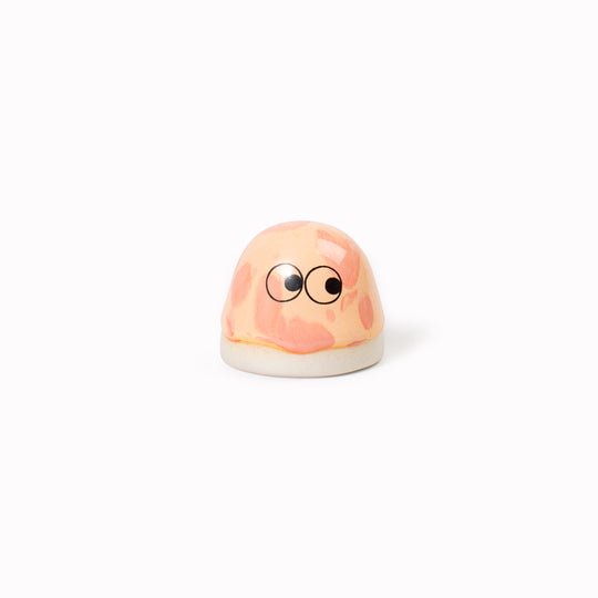 Inspired by Japanese Shinto beliefs that all objects have a soul each Familia Dot member is given life with a cute pair of eyes. They are hand-cast in solid, heavy white porcelain