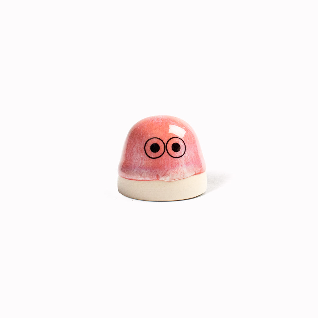 Inspired by Japanese Shinto beliefs that all objects have a soul each Familia Dot member is given life with a cute pair of eyes. They are hand-cast in solid, heavy white porcelain