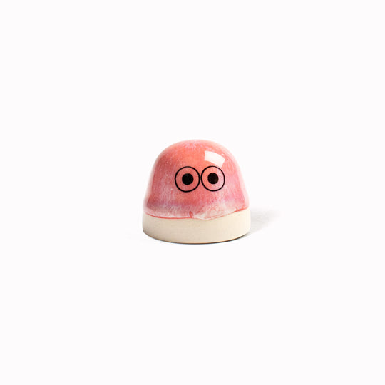 Inspired by Japanese Shinto beliefs that all objects have a soul each Familia Dot member is given life with a cute pair of eyes. They are hand-cast in solid, heavy white porcelain