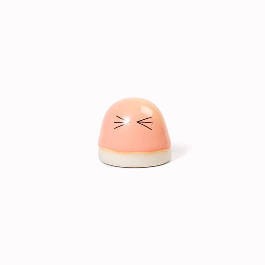 Inspired by Japanese Shinto beliefs that all objects have a soul each Familia Dot member is given life with a cute pair of eyes. They are hand-cast in solid, heavy white porcelain