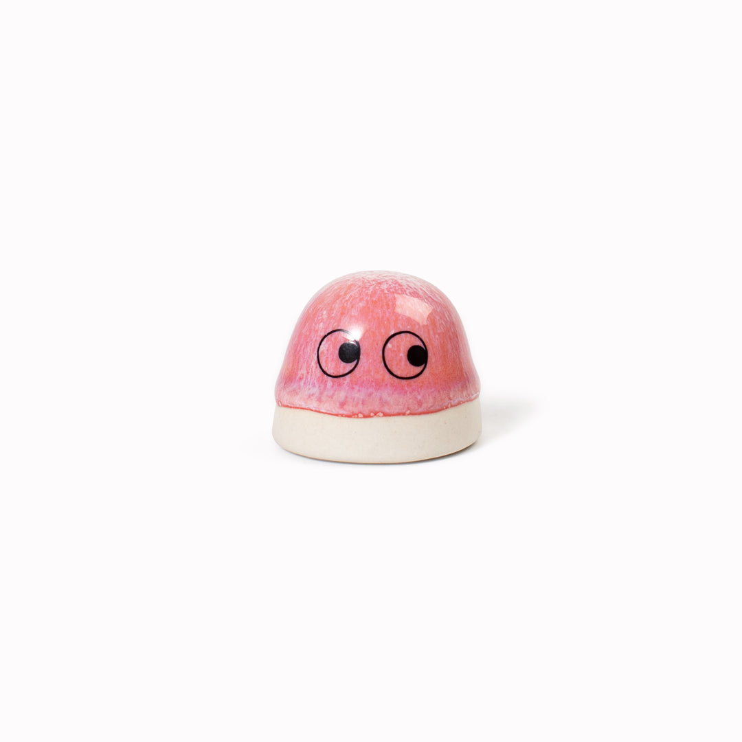 Inspired by Japanese Shinto beliefs that all objects have a soul each Familia Dot member is given life with a cute pair of eyes. They are hand-cast in solid, heavy white porcelain