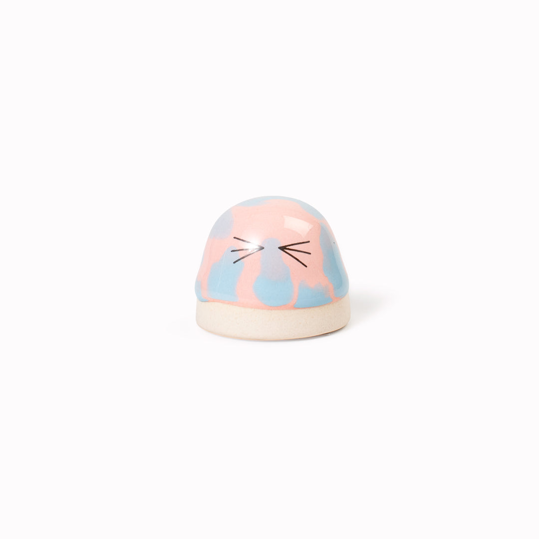 Inspired by Japanese Shinto beliefs that all objects have a soul each Familia Dot member is given life with a cute pair of eyes. They are hand-cast in solid, heavy white porcelain