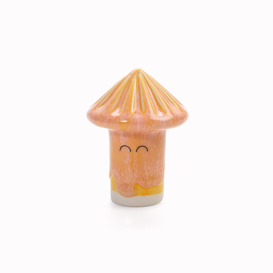 Meet Osu! Osu has a pyramid shaped head and is a hand glazed ceramic figurine created as a close relative of the classic Arhoj Ghost.