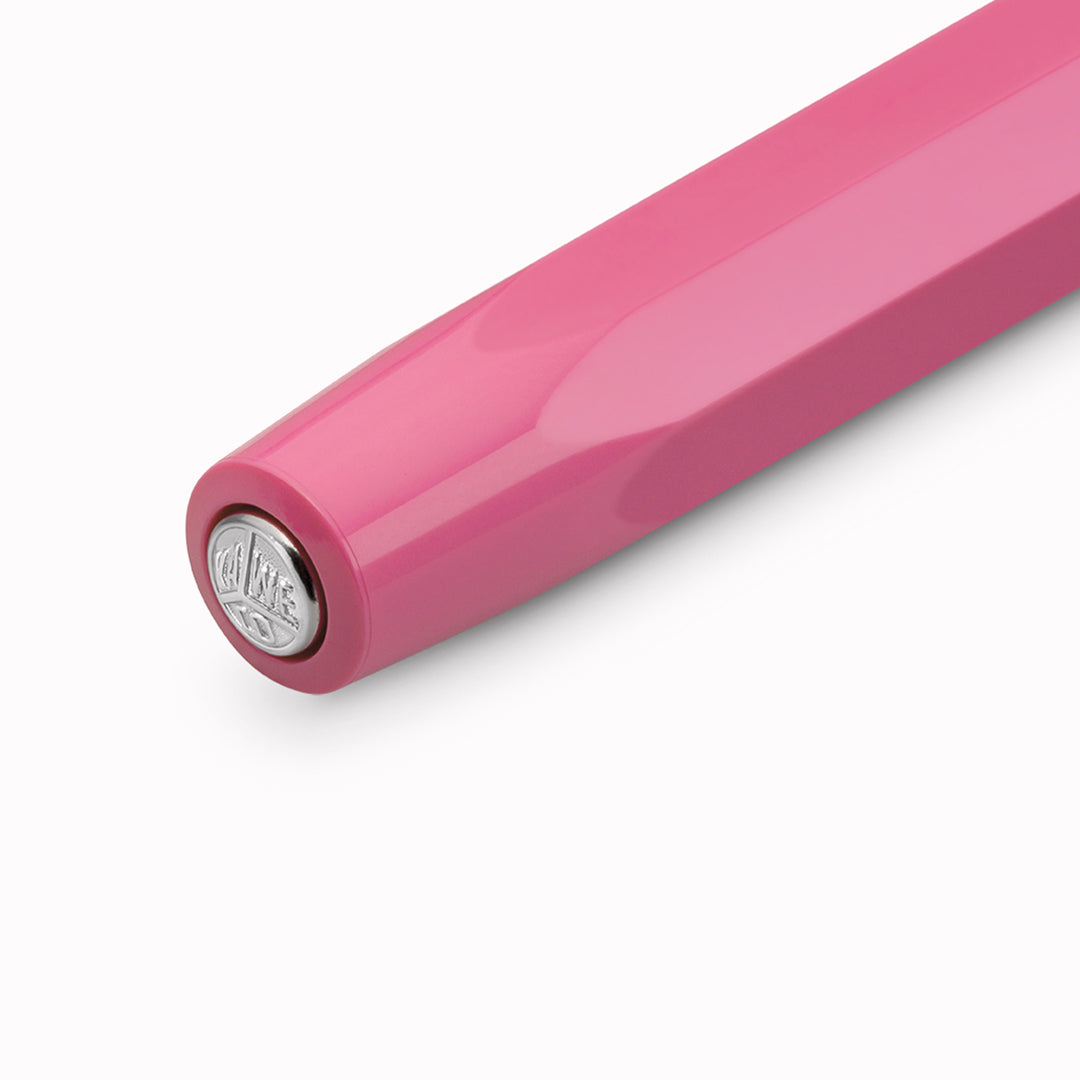The Kaweco Skyline Sport rollerball pen in a vibrant pink colour with silver accents. Boxed with a&nbsp;G2 rollerball refill.
