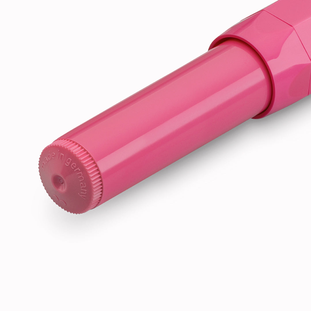 The Kaweco Skyline Sport rollerball pen in a vibrant pink colour with silver accents. Boxed with a&nbsp;G2 rollerball refill.