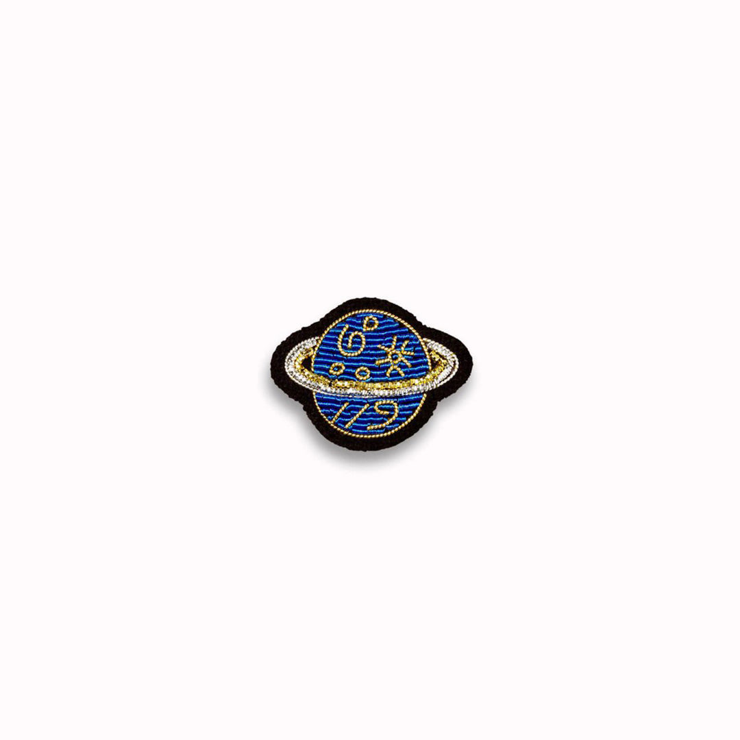 Go go go for new adventures in space - Make a statement with this beautiful Planet hand embroidered decorative lapel pin by Paris based Macon et Lesquoy