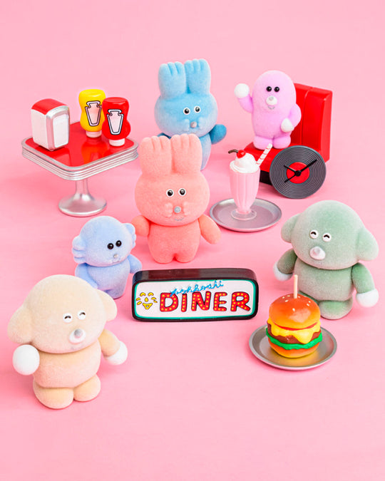 Six fuzzy Pokkoshi characters are hanging out at the diner, accompanied by miniature food, furniture and accessories including burgers, shakes, diner seating and more