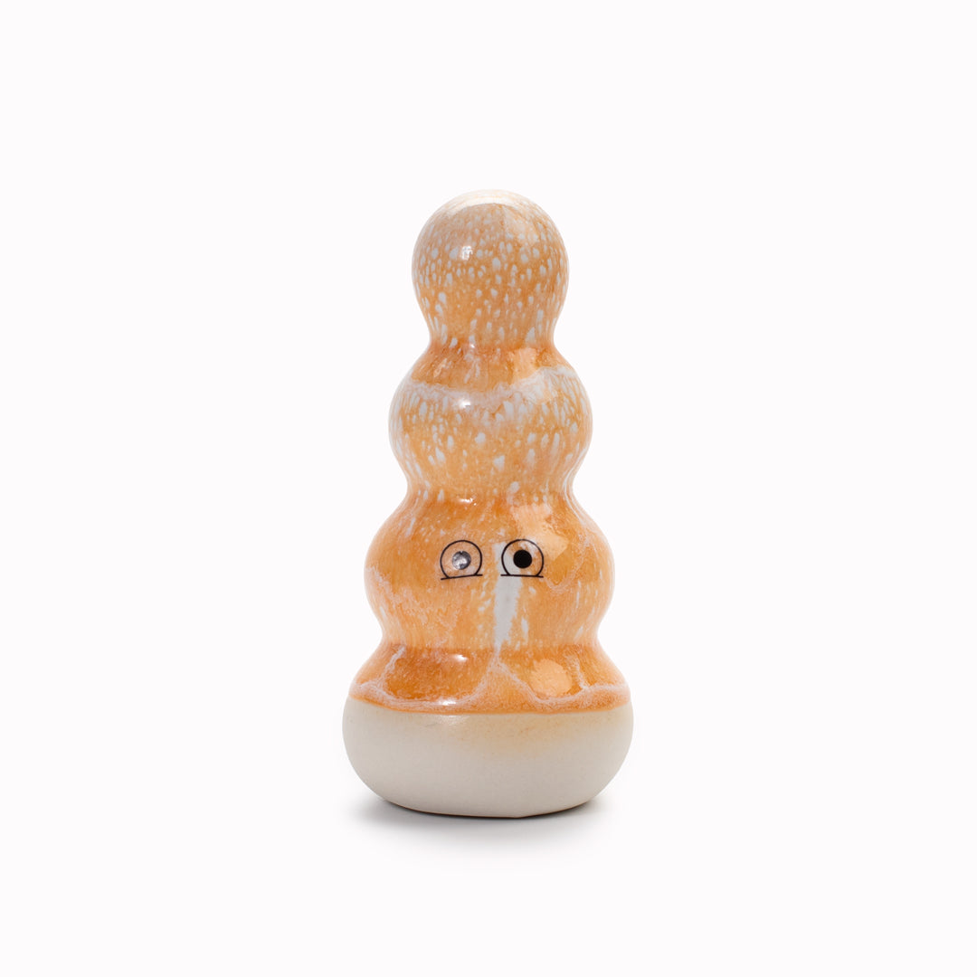 Meet Polo! Polo is a brightly coloured ribbed column and is a hand glazed ceramic figurine created as a close relative of the classic Arhoj Ghost.