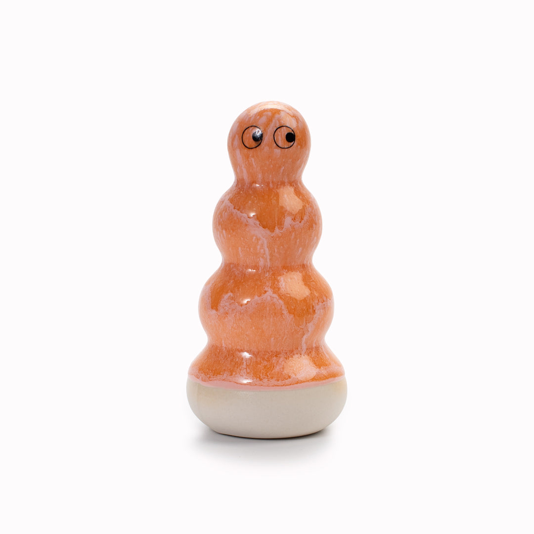 Meet Polo! Polo is a brightly coloured ribbed column and is a hand glazed ceramic figurine created as a close relative of the classic Arhoj Ghost.