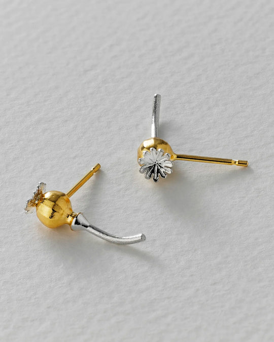 Poppy Head Stud Earrings are a sculptural and elegant pair of botanical stud earrings