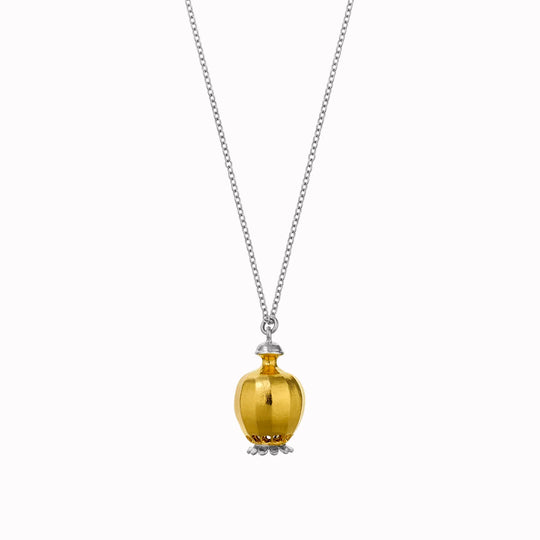 Large Poppy Head Necklace is a stunning sculptural botanical necklace in a mix of silver and gold plated metals. Inside the necklace are tiny silver ball 'shaking seeds' for a subtle sound feature.&nbsp;