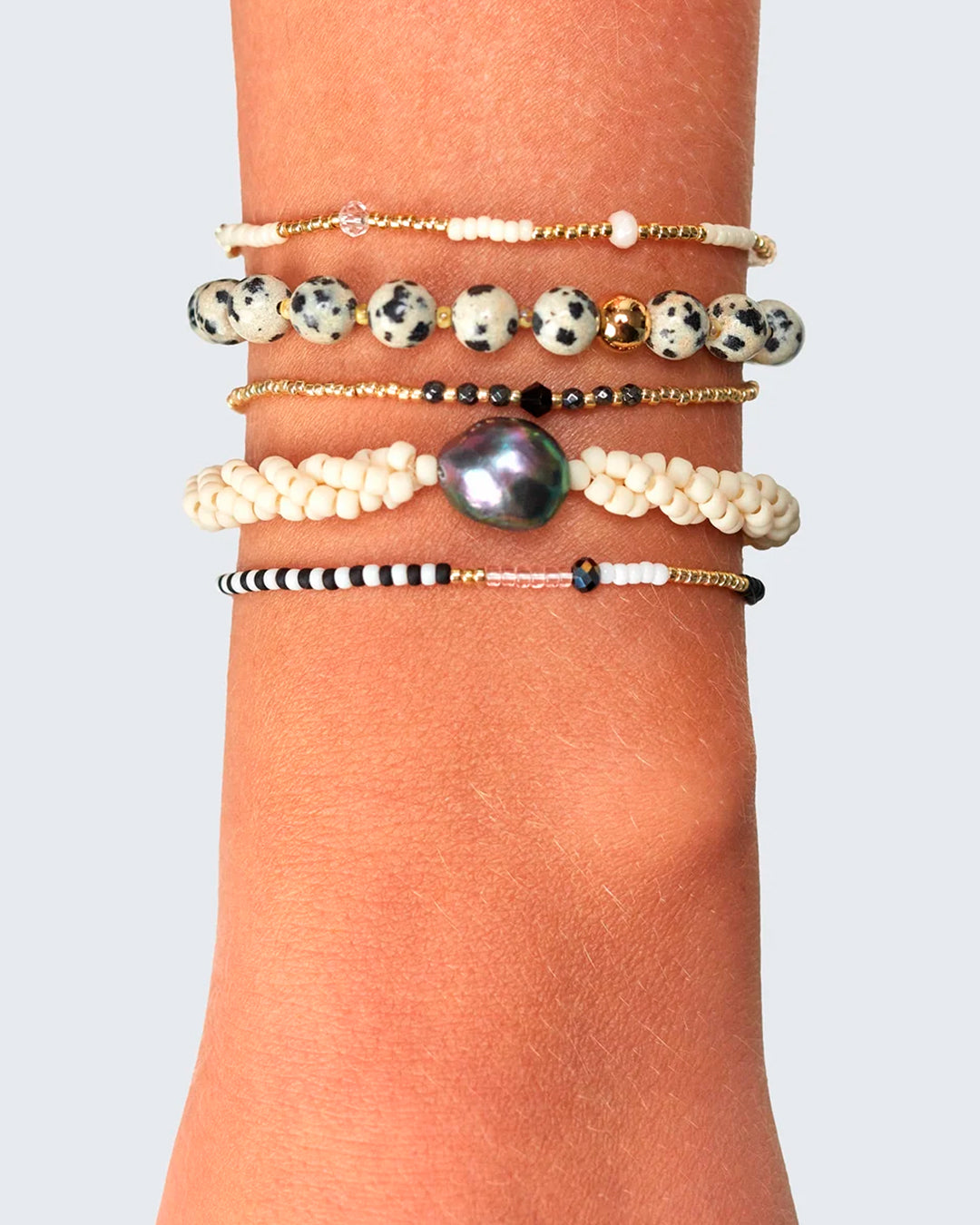 Pops is a colourful beaded bracelet with a playful mix of glass beads and freshwater pearls.