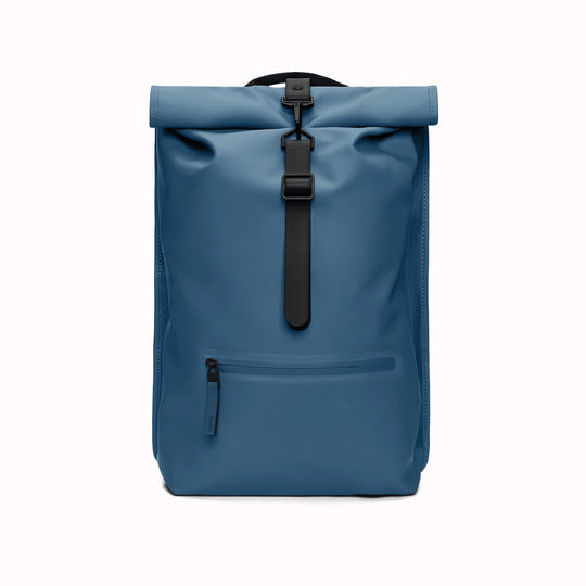 Rolltop Rucksack is Rains’ take on a cycling backpack. Made from Rains’ signature waterproof fabric, this functional backpack has a roll-top closure with an adjustable strap featuring a loop for a bike lock or similar.