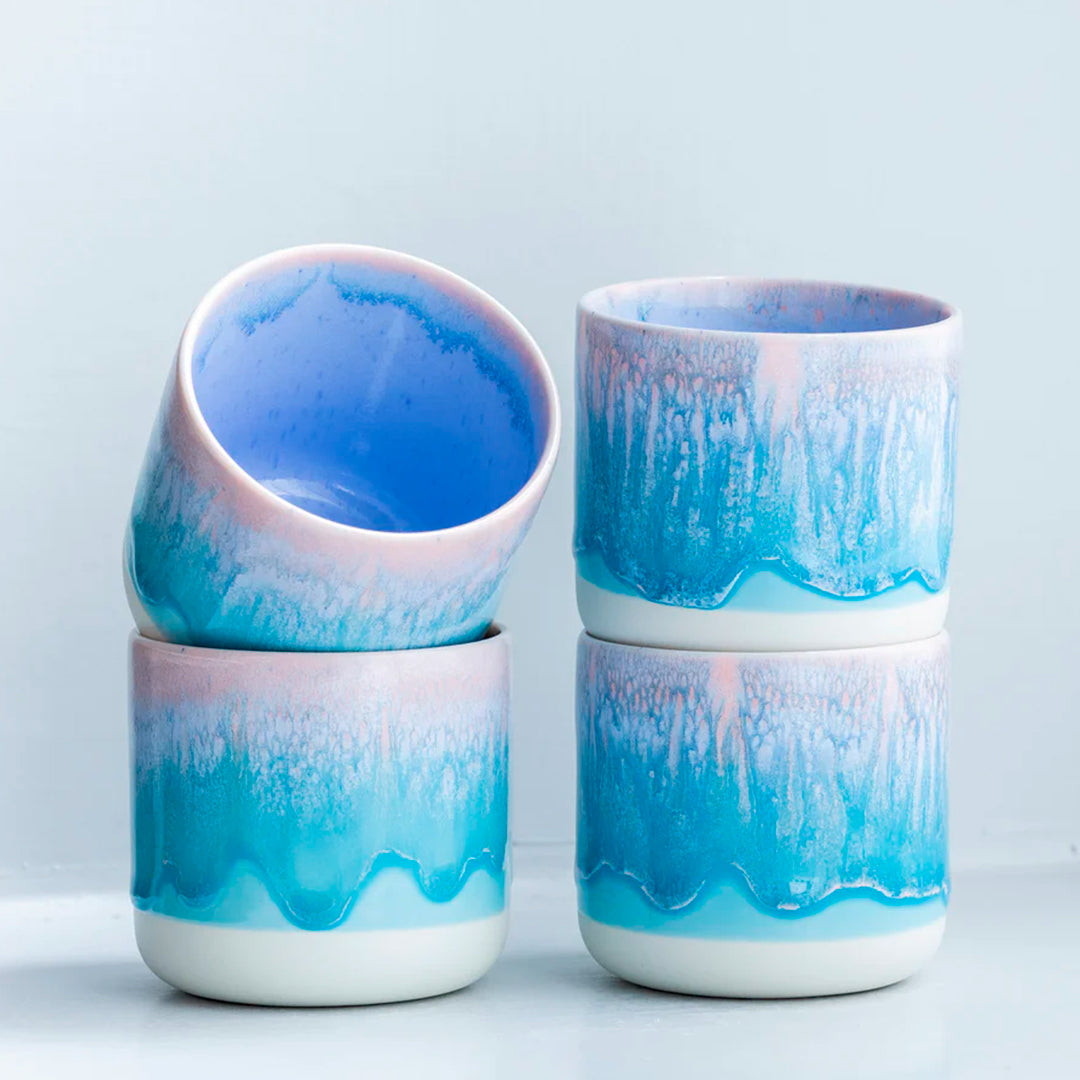 The Quench Cup, introduced in March 2019, is part of the Tokyo tableware series. The porcelain cup fits perfectly in your hand, allowing you to snack or drink away while watching television.