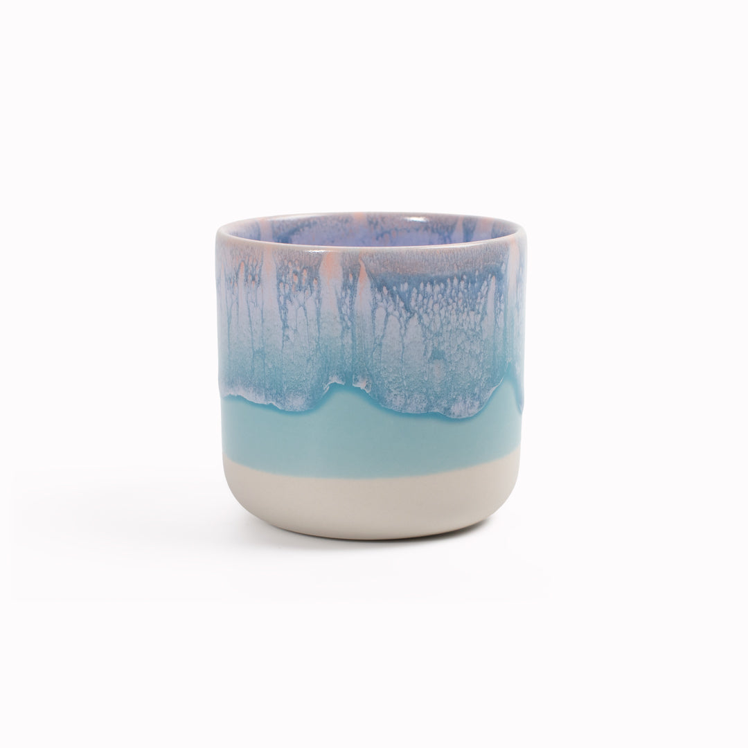 The Quench Cup, introduced in March 2019, is part of the Tokyo tableware series. The porcelain cup fits perfectly in your hand, allowing you to snack or drink away while watching television.