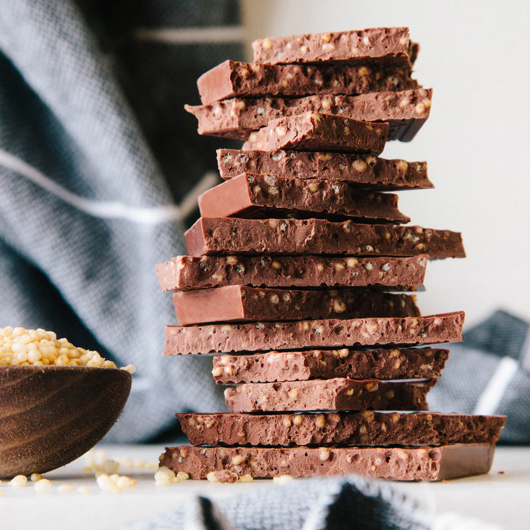 Bean-to-bar milk chocolate with toasted quinoa for a light, crisp texture and balanced cocoa sweetness.