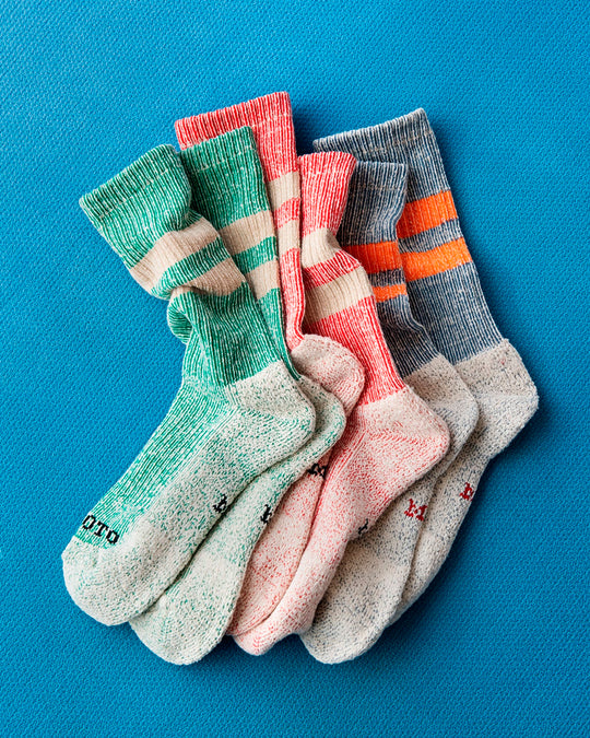 Rototo Pile Stripe Marl Socks are a perfect blend of style and comfort. These premium Japanese socks are crafted on traditional, low-gauge, non-computerized knitting machines, ensuring a unique and high-quality finish.