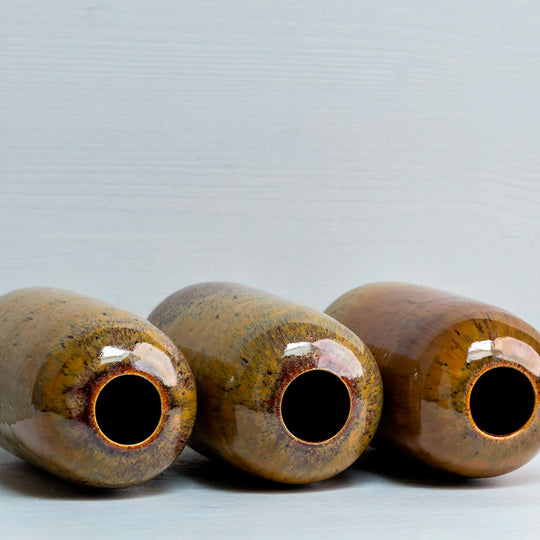 The Yuki Vase by Studio Arhoj is a compact ceramic vase designed for small/medium floral arrangements. Part of the studio’s Edo Series, it reflects a more sculptural side of the Copenhagen workshop’s ceramics