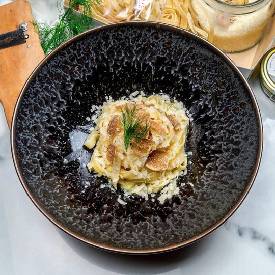 Black Pearl Ramen Bowl is made of 'Minoyaki' porcelain and is 25cm in diameter and 8cm high,  no two pieces are the same, due to the unique hand glazing technique used to create this pattern. Lifestyle image