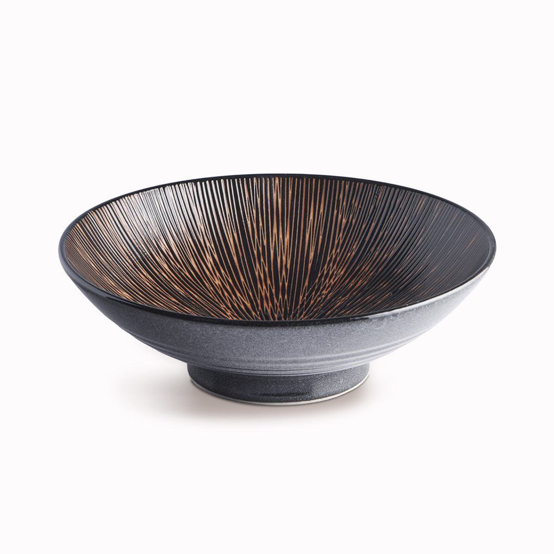 Bronze Converging Lines Ramen Bowl is made of 'Minoyaki' porcelain and is 25cm in diameter and 8cm high, no two pieces are the same, due to the unique hand glazing technique used to create this pattern.