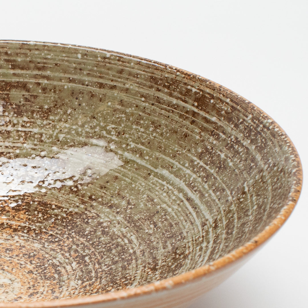 Ramen bowl from Made in Japan with Terracotta Green glazing, featuring a rustic glaze with striking green splash. Perfect for Noodles. the bowl is around 8cm high and 25cm in diameter.