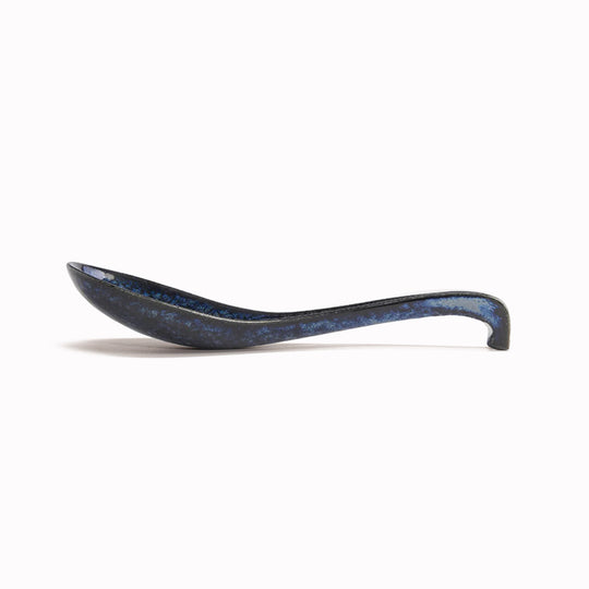 A large soup spoon perfect for Ramen!&nbsp;17.5cm long in an indigo blue glaze, made of 'Minoyaki' porcelain, fired at a high temperature and hand finished in Gifu prefecture, Japan.