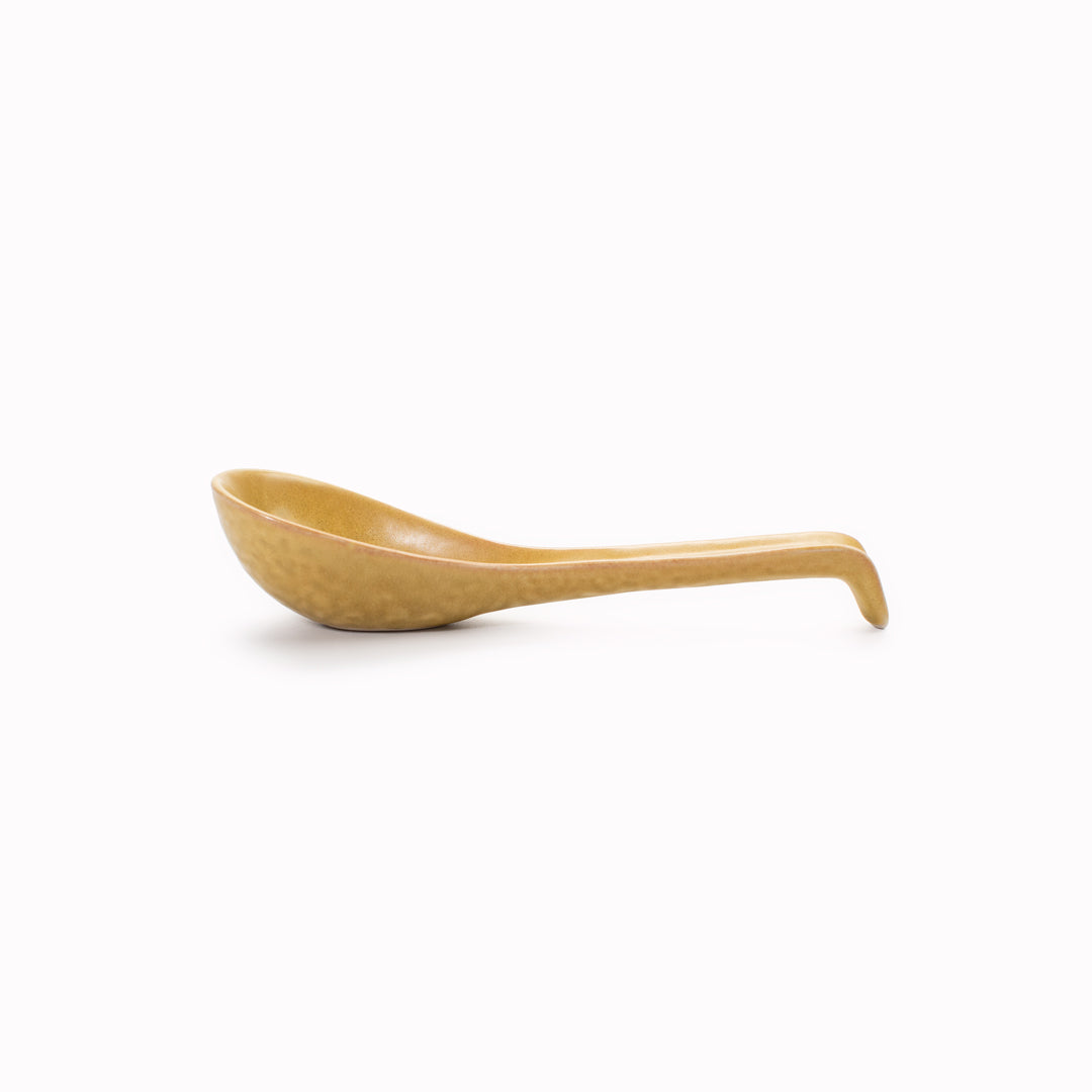 A large Appetiser / Soup spoon perfect for Ramen! 15.5cm long in an Ochre glaze, The spoon sits flat on the table