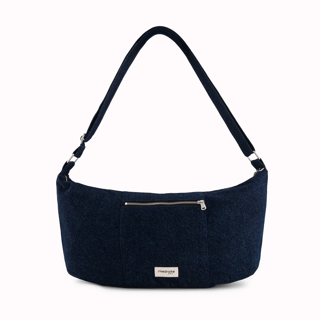 Front View - Discover Charlot, the new recycled cotton crossbody bag from Rive Droite in raw denim. Can be worn as a shoulder bag or over the shoulder.