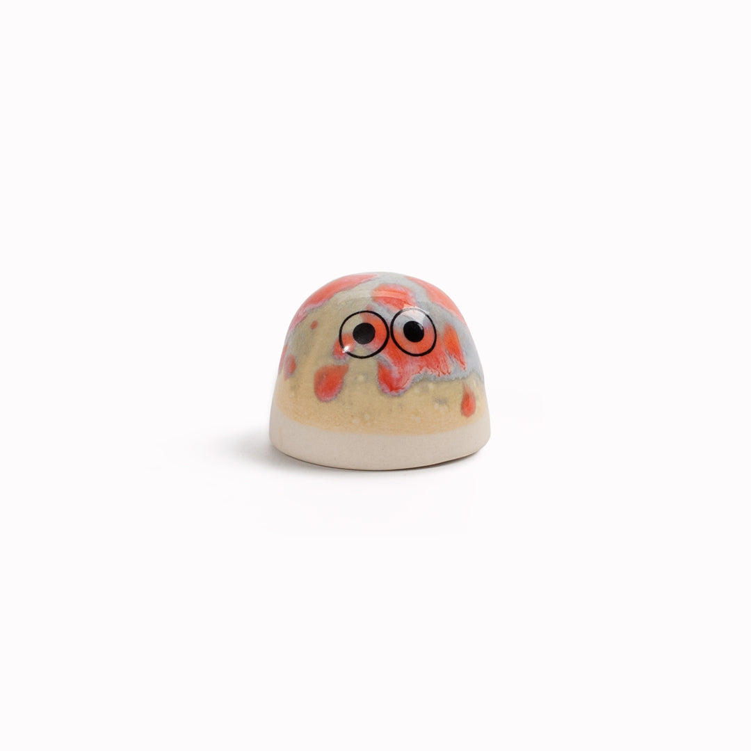 The smallest of the Arhoj decorative ornament figurine family, these tiny little cute dots still have all the personality of their larger siblings. Colourful and handmade in Copenhagen, they have all the Arhoj trademarks with their thick multi coloured glazes and Japanese ceramic influence.