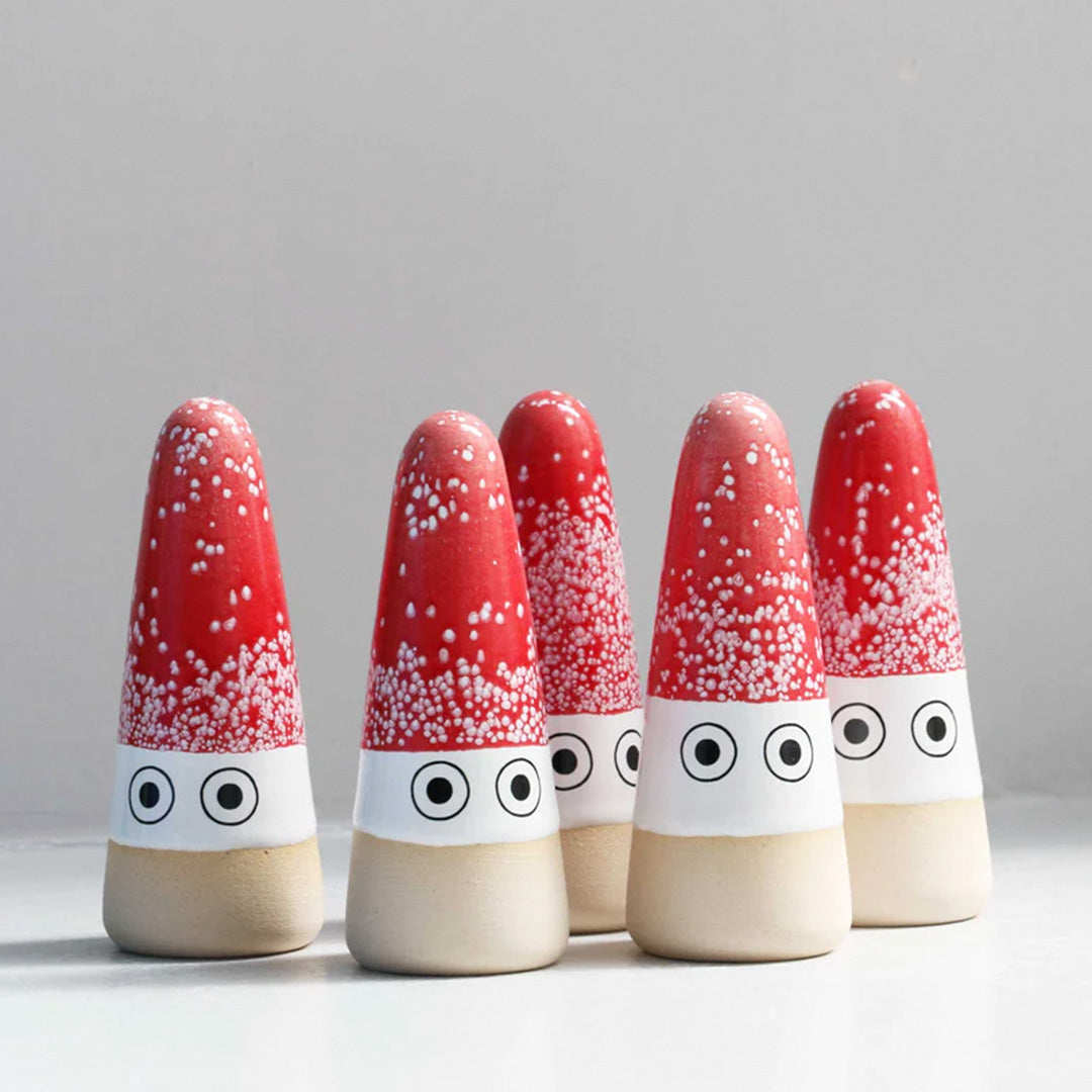 The Mini Nisse by Studio Arhoj are smaller, cuter versions of the iconic ceramic Arhoj Ghost figurine, in traditional Christmas colours. Collection Image