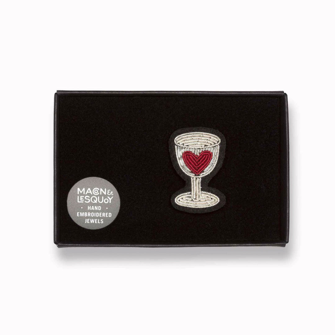 Hand-embroidered 'Red Wine Love' design lapel pin by Parisian fashion accessory brand Macon et Lesquoy. Measures approximately 33mm by 20mm.