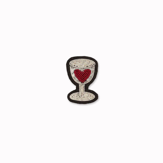 Hand-embroidered 'Red Wine Love' design lapel pin by Parisian fashion accessory brand Macon et Lesquoy. Measures approximately 33mm by 20mm.