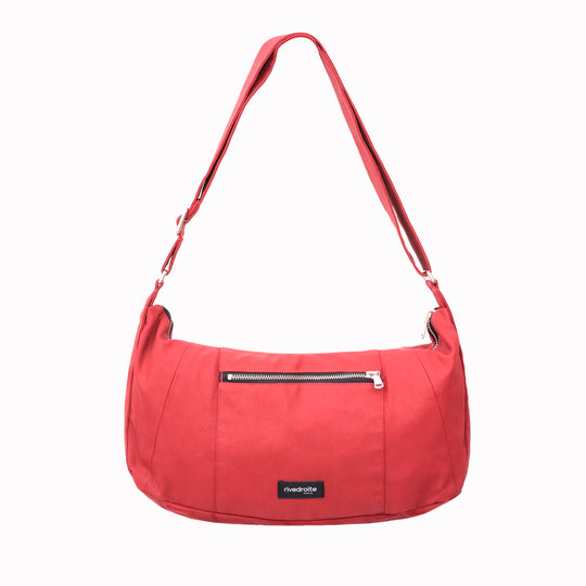The Mini Charlot is a compact shoulder bag large enough for all your daily essentials. For AW26 the bag is made from a 100% organic cotton canvas fabric with a water resistant coating
