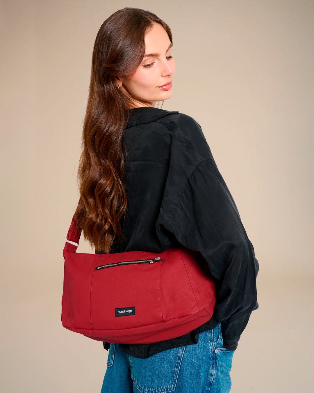 The Mini Charlot is a compact shoulder bag large enough for all your daily essentials. For AW26 the bag is made from a 100% organic cotton canvas fabric with a water resistant coating