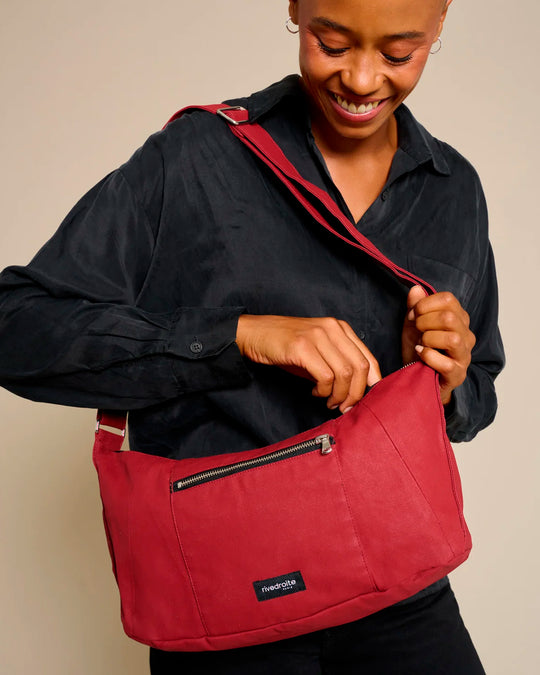 The Mini Charlot is a compact shoulder bag large enough for all your daily essentials. For AW26 the bag is made from a 100% organic cotton canvas fabric with a water resistant coating
