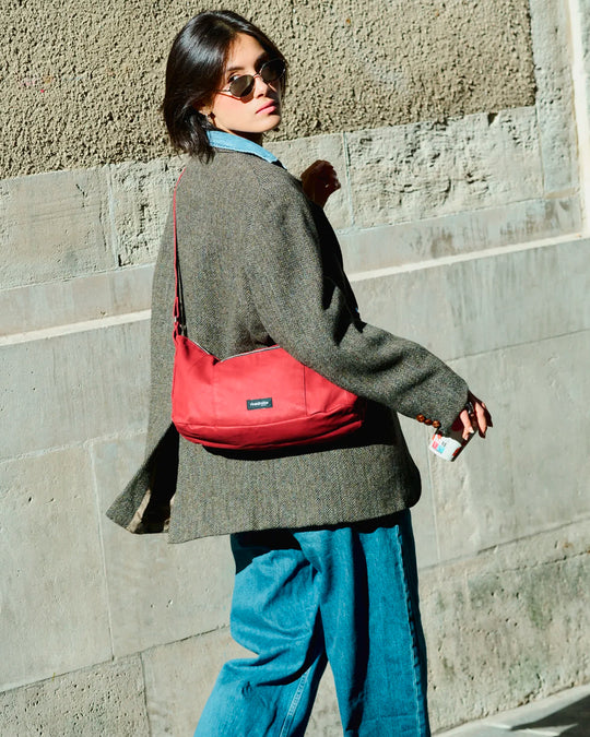 The Mini Charlot is a compact shoulder bag large enough for all your daily essentials. For AW26 the bag is made from a 100% organic cotton canvas fabric with a water resistant coating