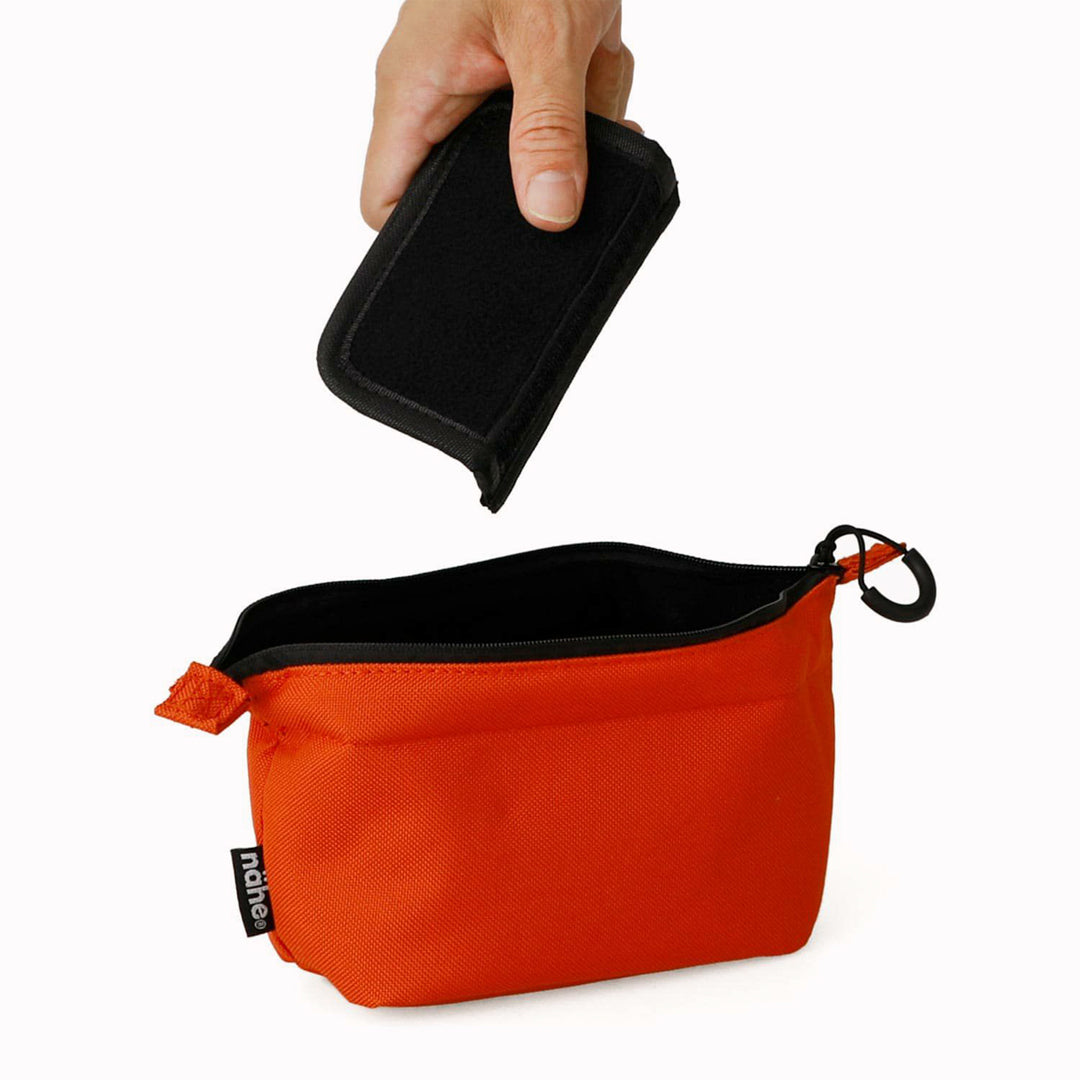 A highly versatile small soft carry case from Hightide Nahe, Japan. The polyester pouch is suitable for storing small tech, cables and more