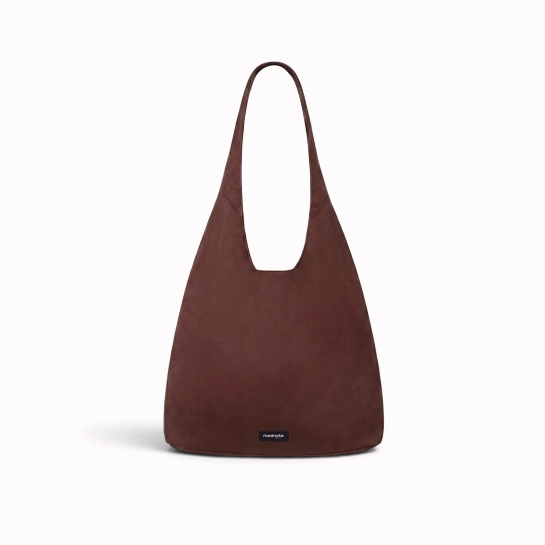 The Richelieu is Rive Droite's roomy hobo bag, made with a waxed finish to give their AW26 collection a richer colour and a worn in appearance over time