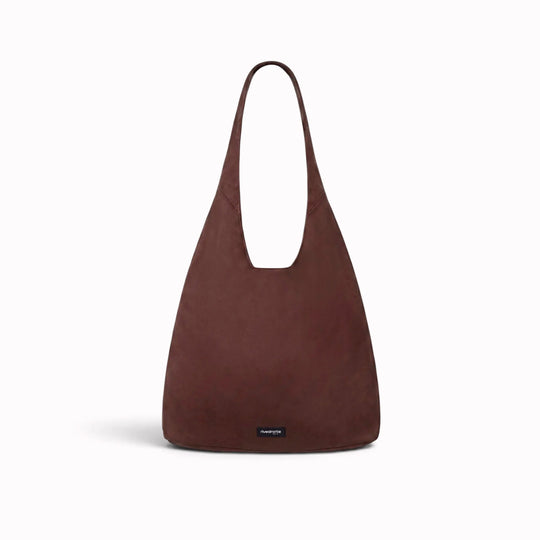 The Richelieu is Rive Droite's roomy hobo bag, made with a waxed finish to give their AW26 collection a richer colour and a worn in appearance over time