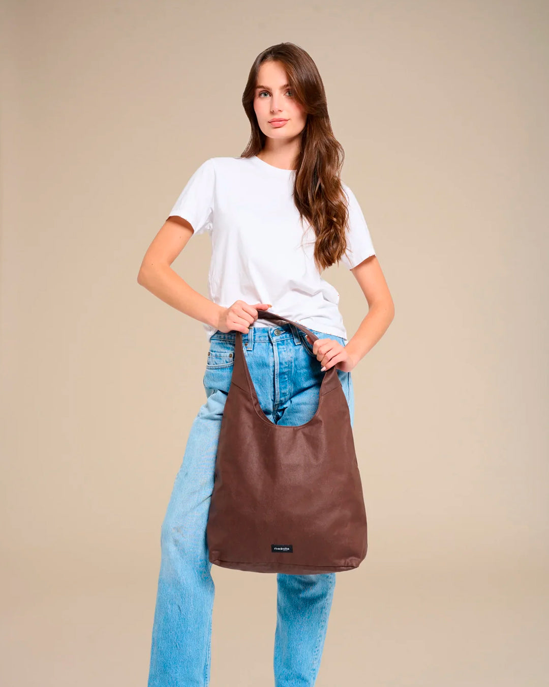 The Richelieu is Rive Droite's roomy hobo bag, made with a waxed finish to give their AW26 collection a richer colour and a worn in appearance over time
