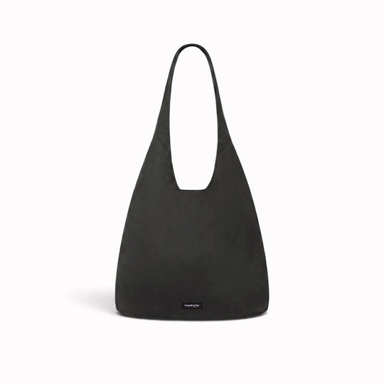 The Richelieu is Rive Droite's roomy hobo bag, made with a waxed finish to give their AW26 collection a richer colour and a worn in appearance over time