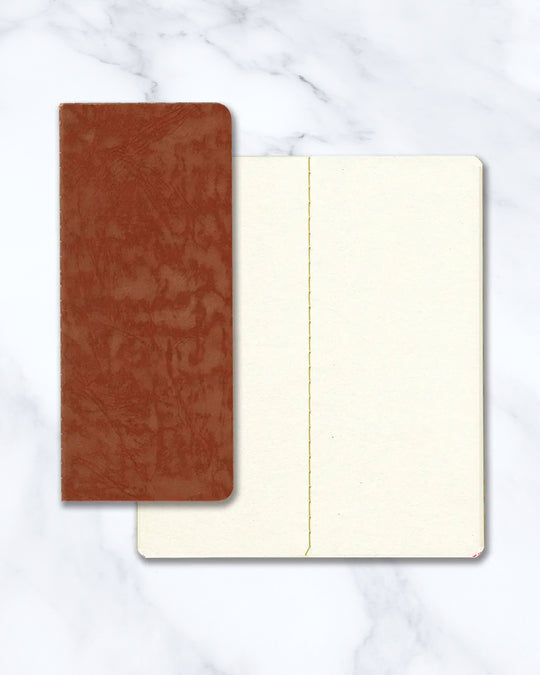 Ro-biki in Japanese means 'waxed'. Their refill notebooks will take on their own patina over time, and this is part of their charm.