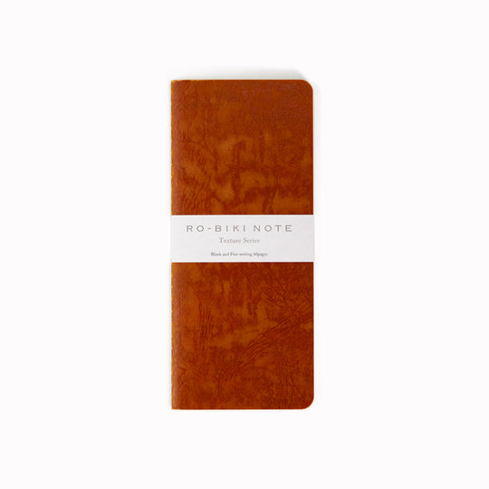 Ro-biki in Japanese means 'waxed'. Their refill notebooks will take on their own patina over time, and this is part of their charm.