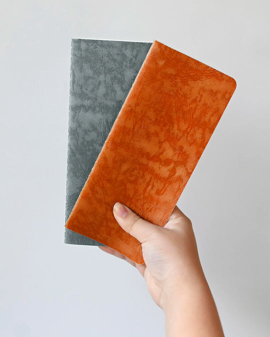 Ro-biki in Japanese means 'waxed'. Their refill notebooks will take on their own patina over time, and this is part of their charm.